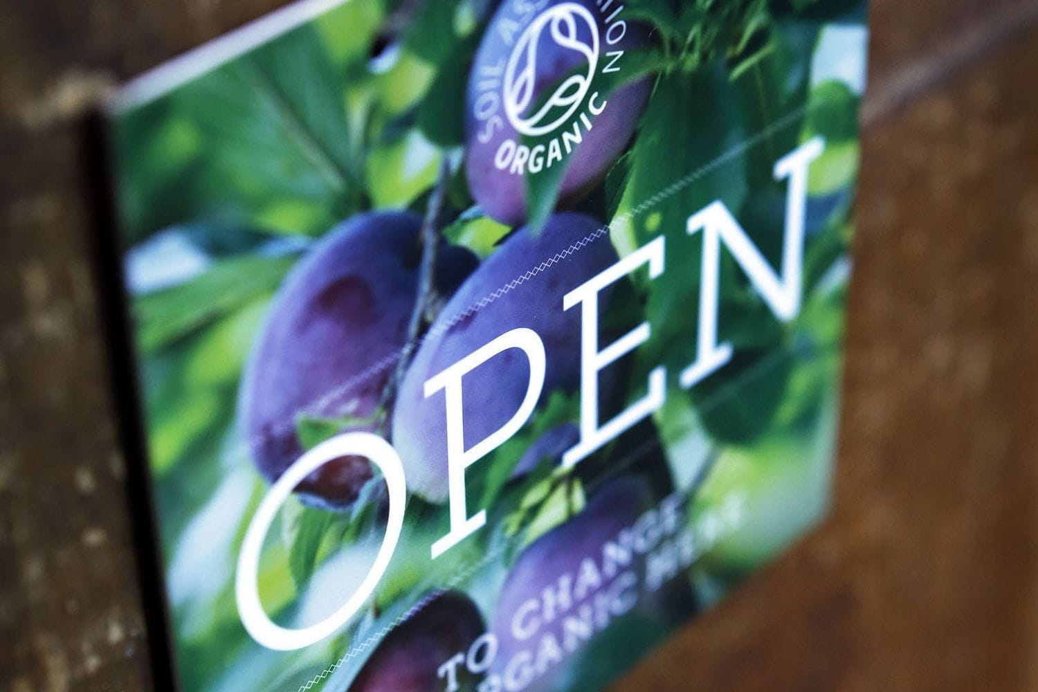 A shop sign bearing the Soil Association Certification organic symbol