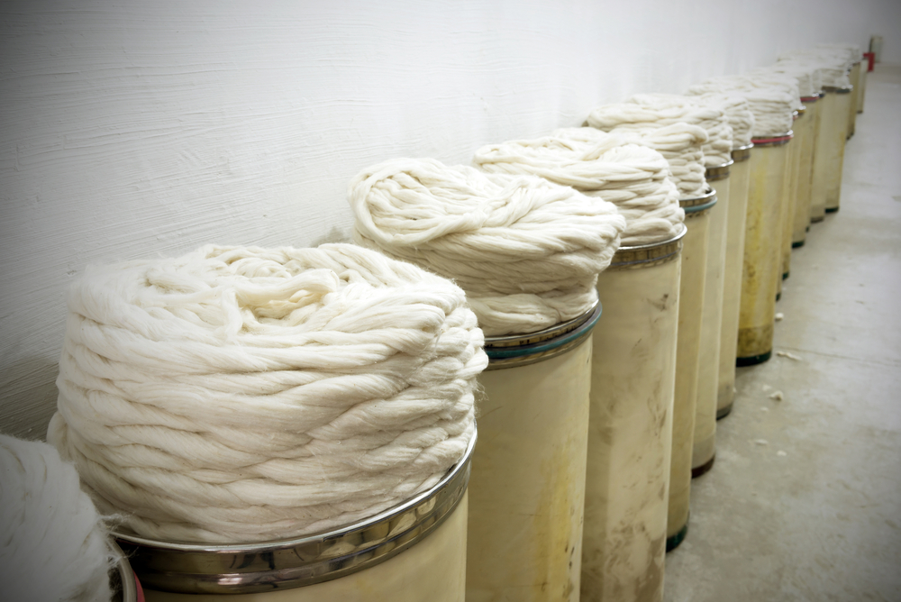 Barrels of coiled fabric